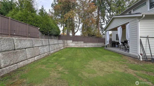 a view of a backyard with a garden