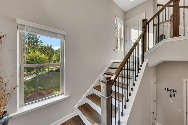a living room with fireplace furniture and a flat screen tv