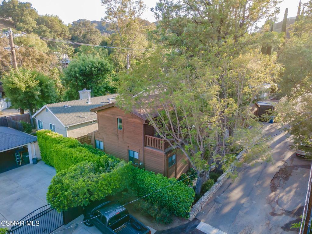 6078 Peppertree Lane Simi Valley, CA 93063 - Photo 58 of 59 an aerial view of a house with a yard
