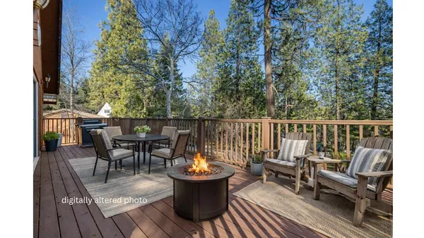 a view of balcony with wooden floor and outdoor seating