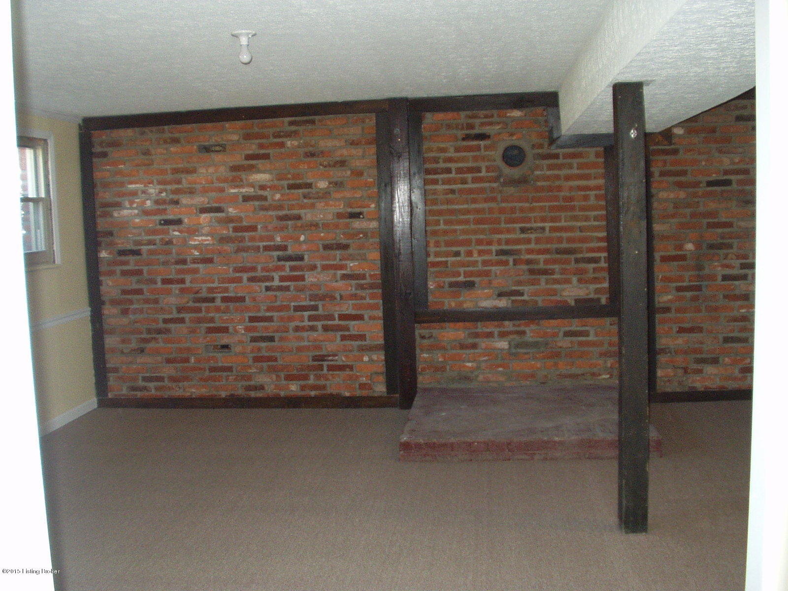 245 Western Road Louisville, KY 40229 - Photo 13 of 28 Spacious family room in lower level with outside entrance!