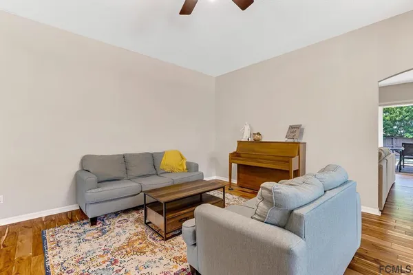 a living room with furniture and a couch