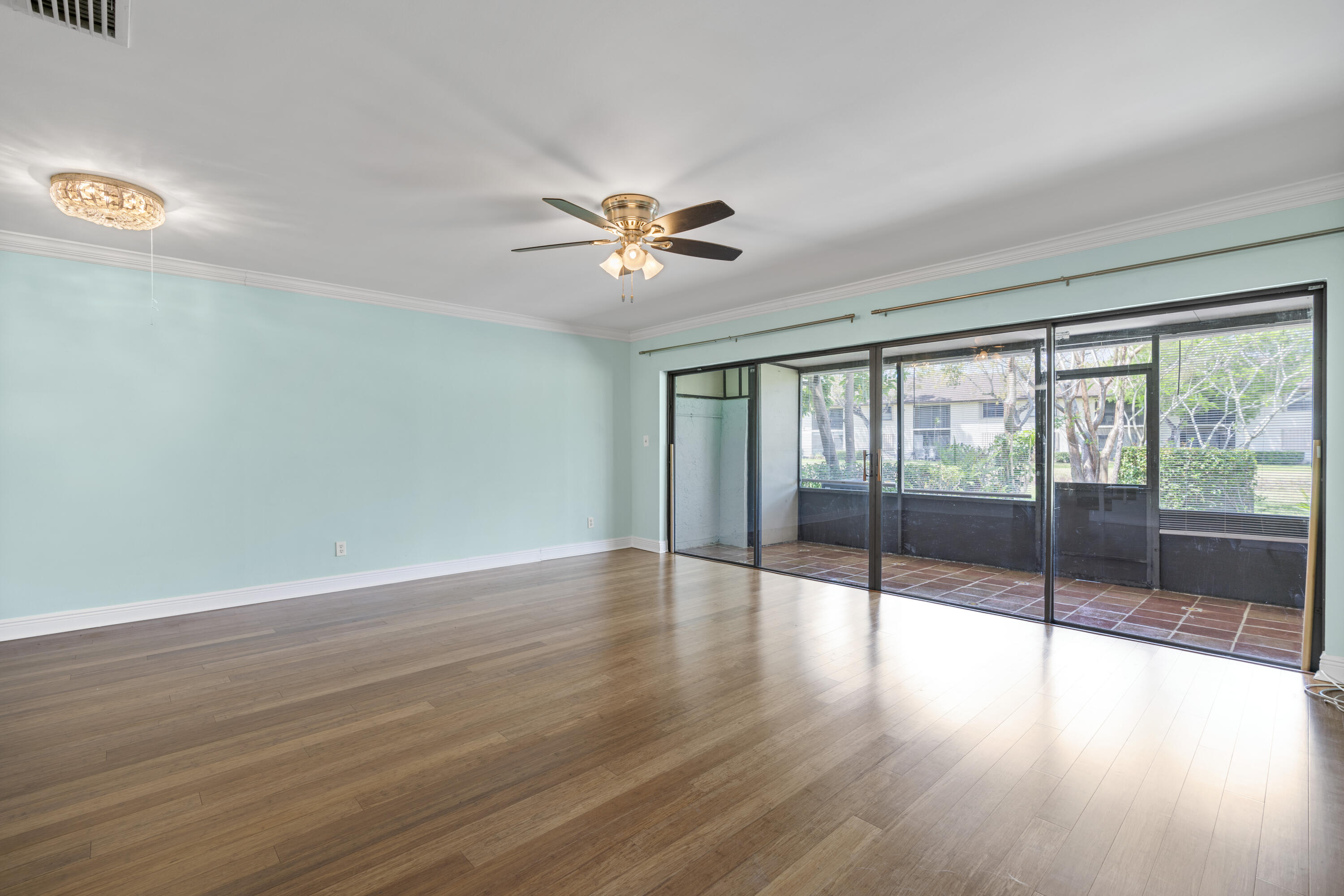 23359 Southwest 55th Way, Unit F Boca Raton, FL 33433 - Photo 34 of 47 Living Room and Patio