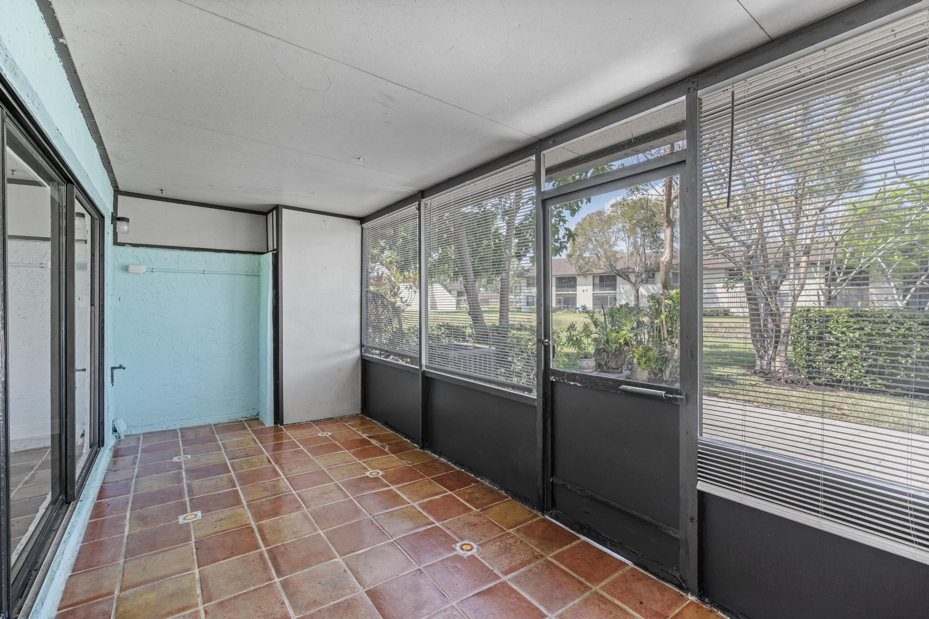 23359 Southwest 55th Way, Unit F Boca Raton, FL 33433 - Photo 35 of 47 Enclosed Patio