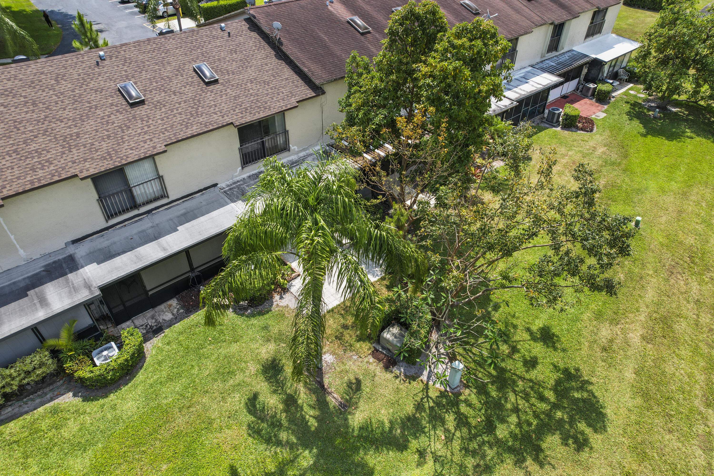 23359 Southwest 55th Way, Unit F Boca Raton, FL 33433 - Photo 41 of 47 Back of Townhome with Patio
