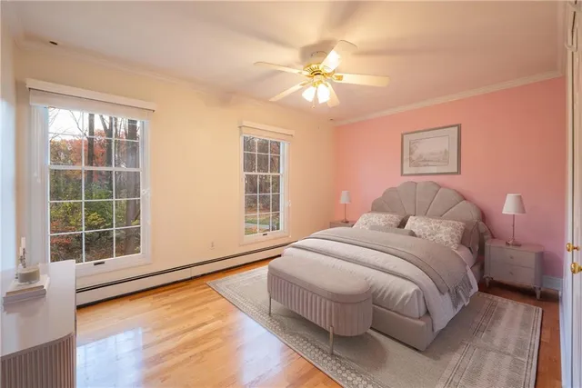 a spacious bedroom with a large bed and a window