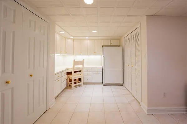 a bathroom with a tub and a shower
