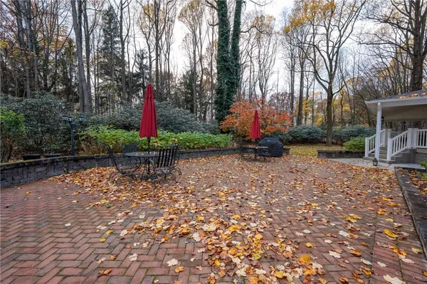 a backyard of a house with lots of green space