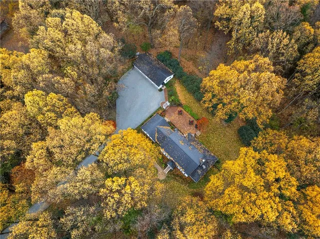 a view of outside house with a yard