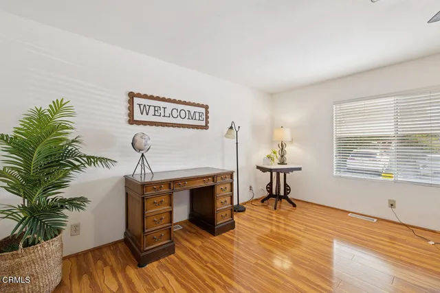 a view of a livingroom with furniture and a fireplace