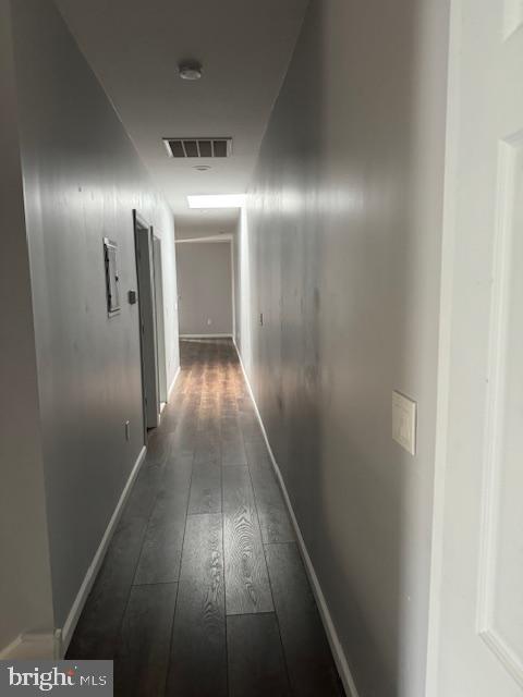 107 West Merchant Street, Unit 2B Audubon, NJ 08106 - Photo 9 of 13 a view of hallway with wooden floor