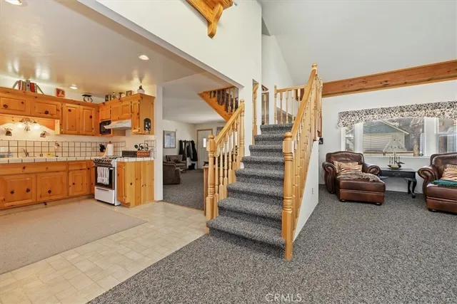 a view of livingroom with furniture and toys