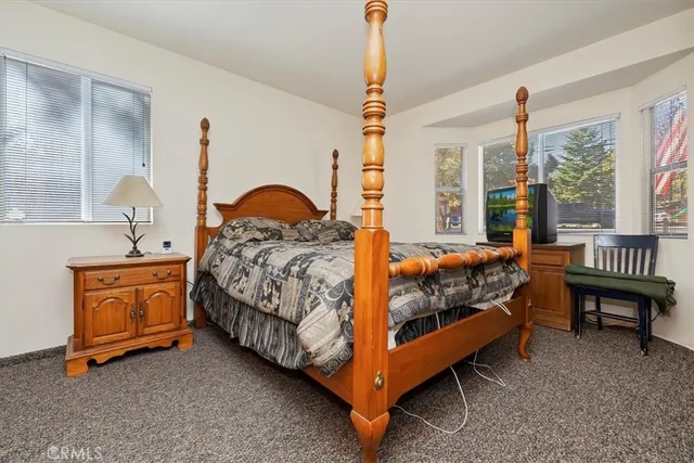 a view of a garage with cars