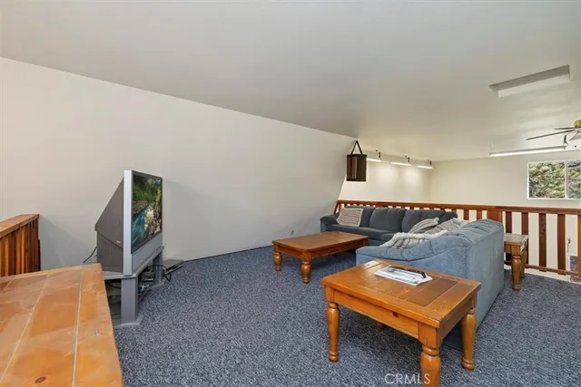 a bathroom with a sink a mirror and a shower