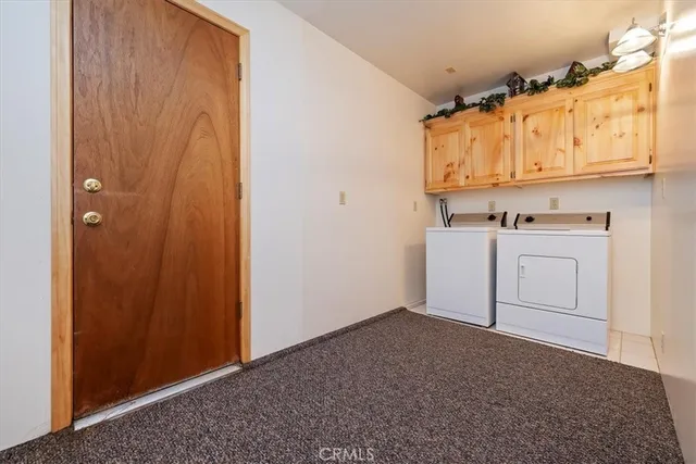 a view of a house with wooden stairs