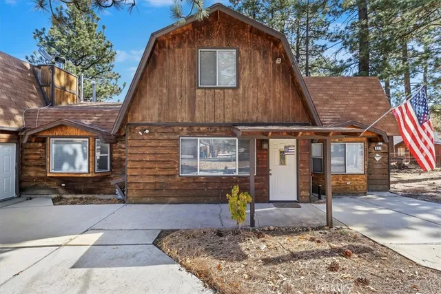 a large kitchen with stainless steel appliances lots of counter top space