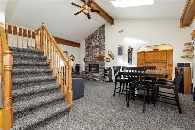 a view of a kitchen with furniture and a kitchen