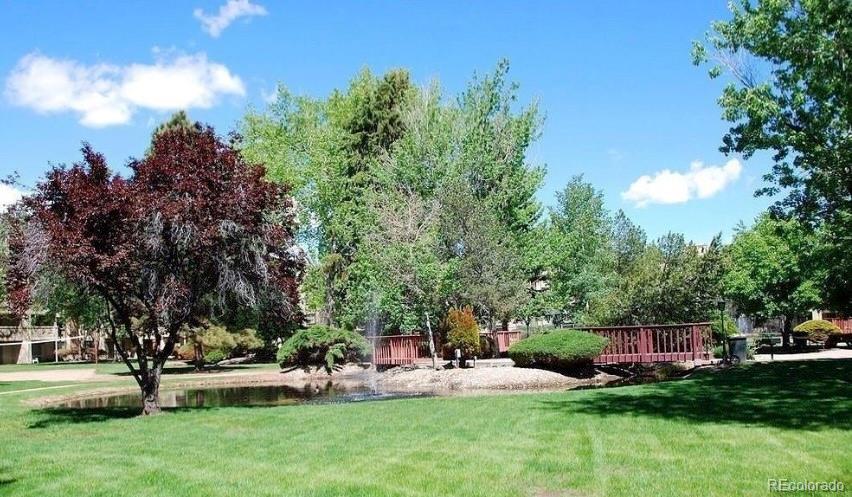 1304 South Parker Road, Unit 146 Denver, CO 80231 - Photo 15 of 22 a view of a house with backyard and sitting area