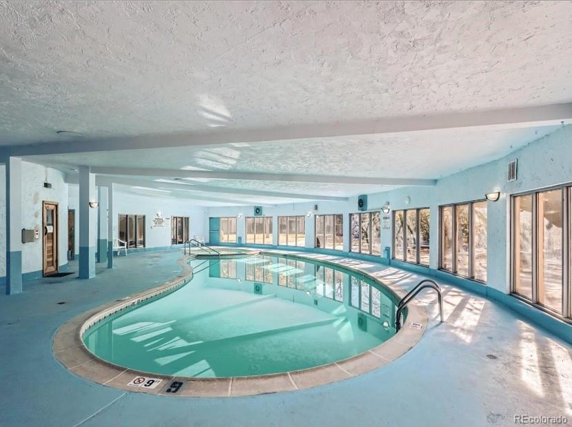 1304 South Parker Road, Unit 146 Denver, CO 80231 - Photo 17 of 22 a view of a swimming pool with furniture