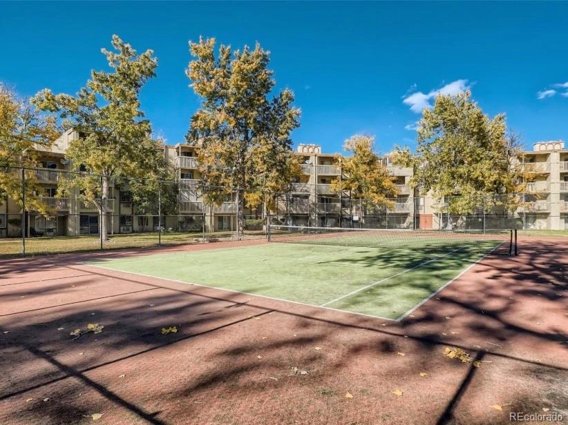 1304 South Parker Road, Unit 146 Denver, CO 80231 - Photo 19 of 22 a view of a playground with basketball court