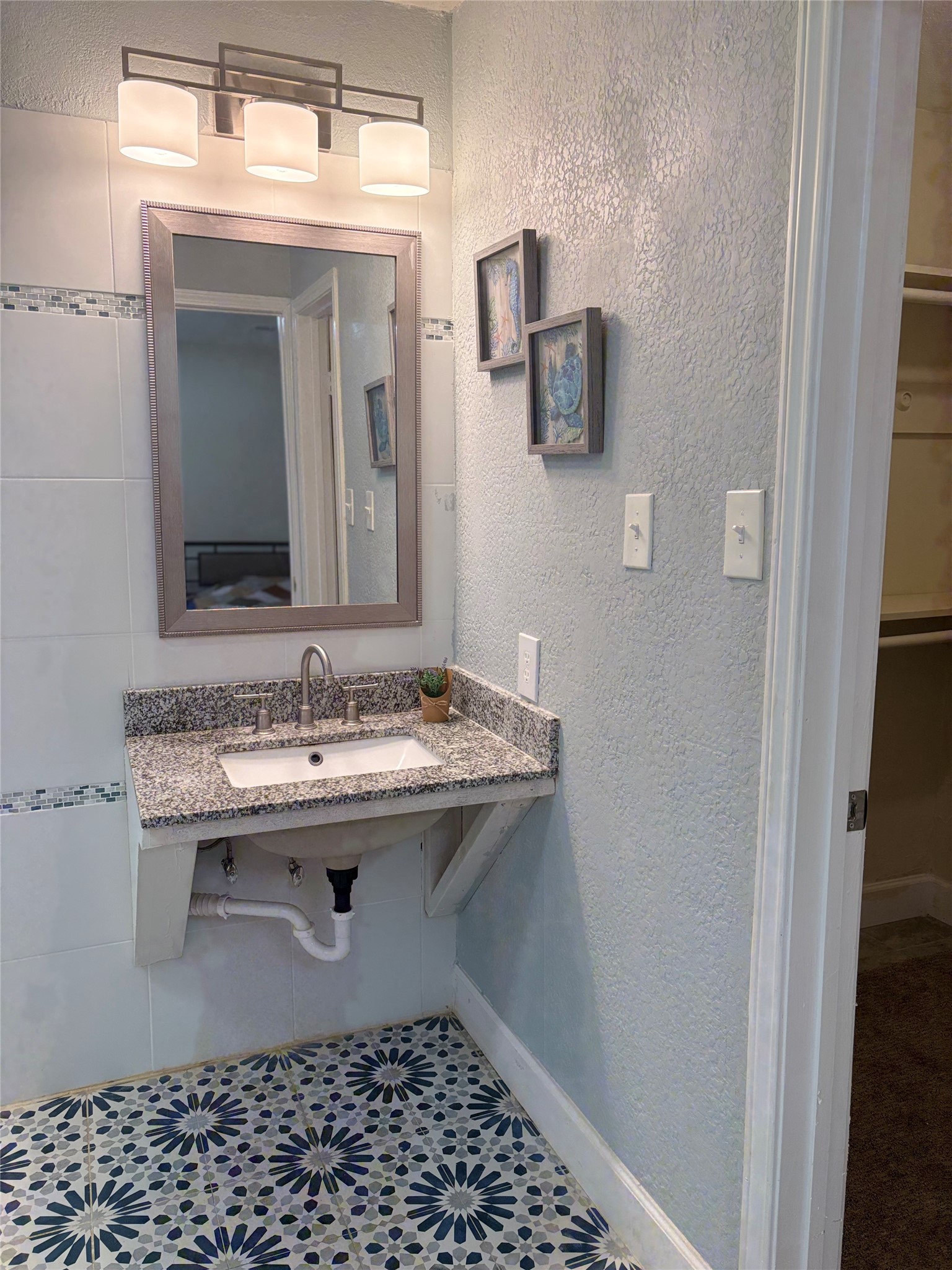 13160 Crystal Trail Conroe, TX 77306 - Photo 12 of 14 Primary bathroom vanity with closet to the right.