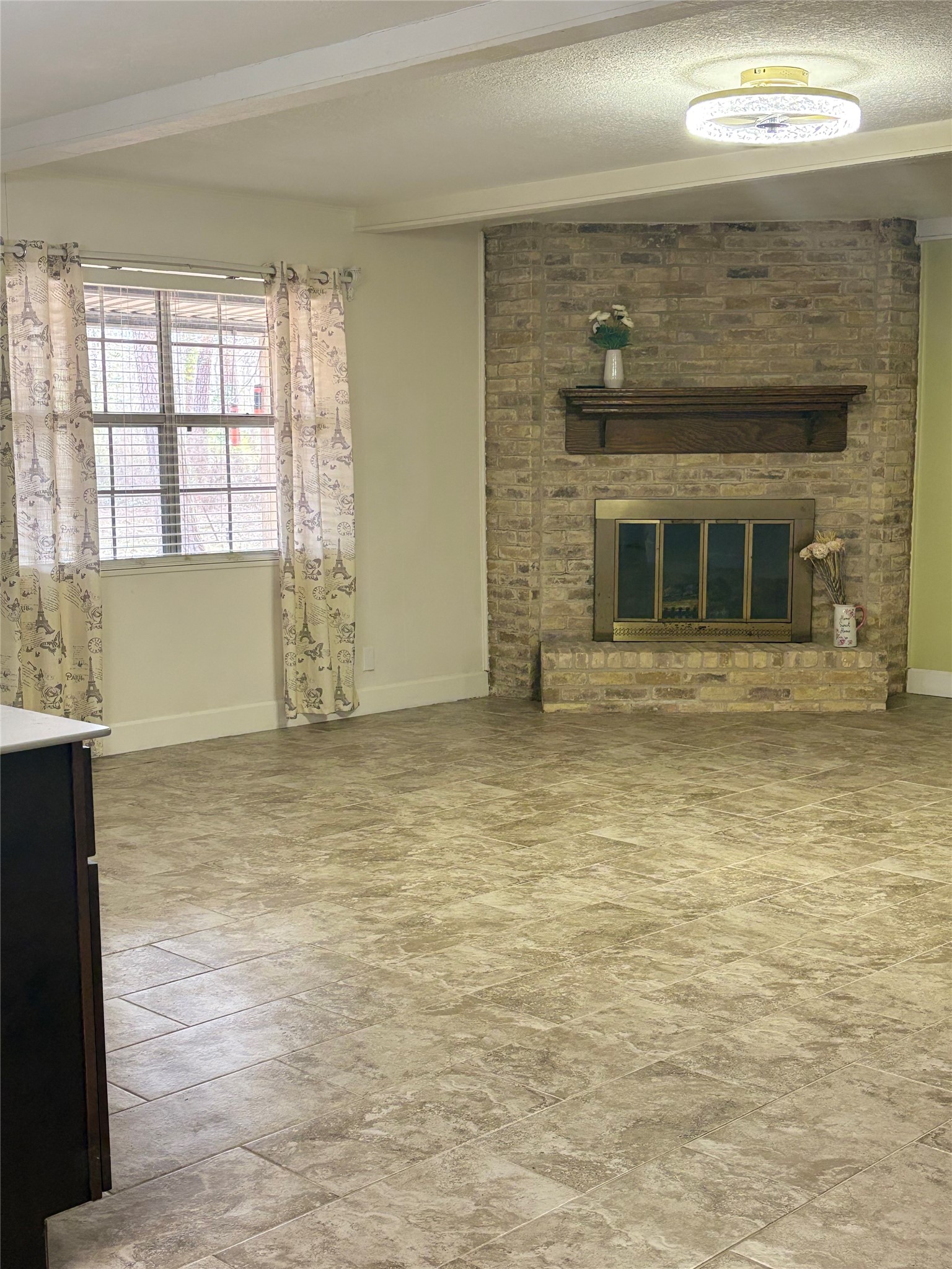 13160 Crystal Trail Conroe, TX 77306 - Photo 6 of 14 The living room is large with a welcoming fireplace!! This picture does not show nearly how big the living room is!