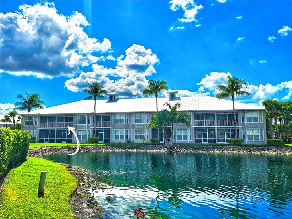 7910 Mahogany Run Lane, Unit 1225 Naples, FL 34113 - Photo 22 of 42 a view of a house with a yard