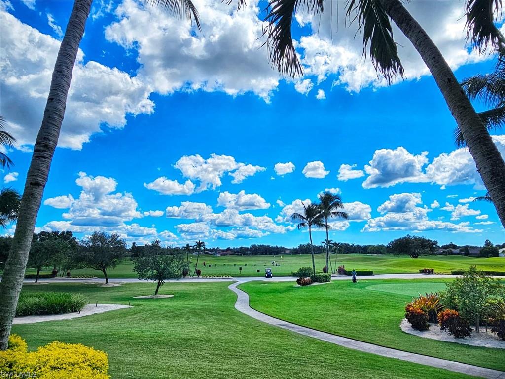 7910 Mahogany Run Lane, Unit 1225 Naples, FL 34113 - Photo 39 of 42 a view of a golf course with a big yard