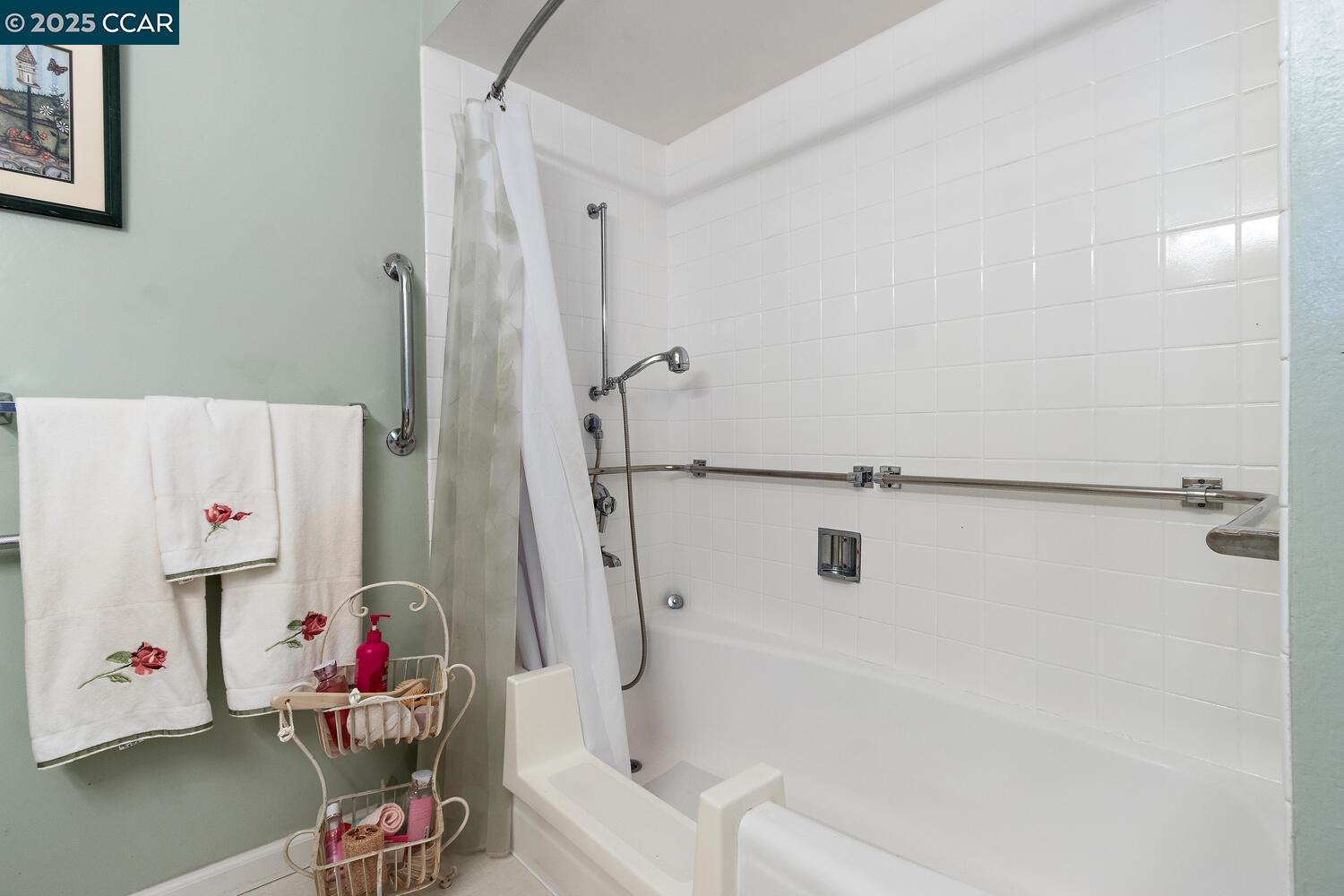 2709 Golden Rain Road, Unit 6 Walnut Creek, CA 94595 - Photo 19 of 46 a bathroom with a tub and a shower