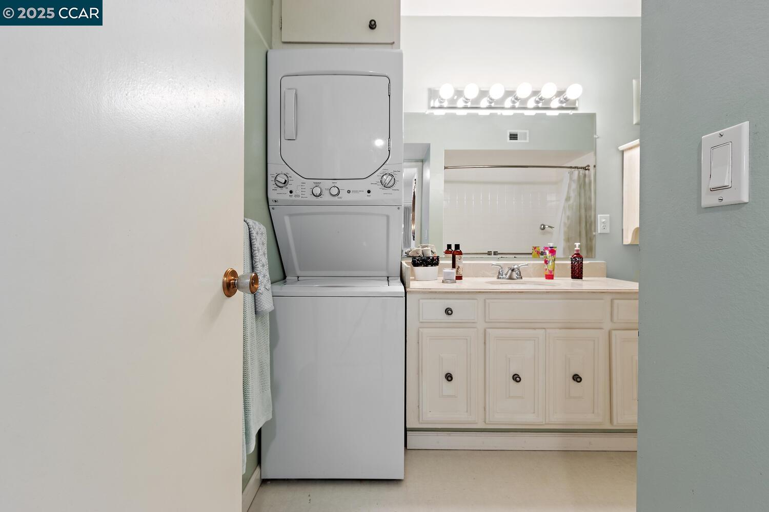 2709 Golden Rain Road, Unit 6 Walnut Creek, CA 94595 - Photo 20 of 46 a bathroom with a sink vanity and a mirror