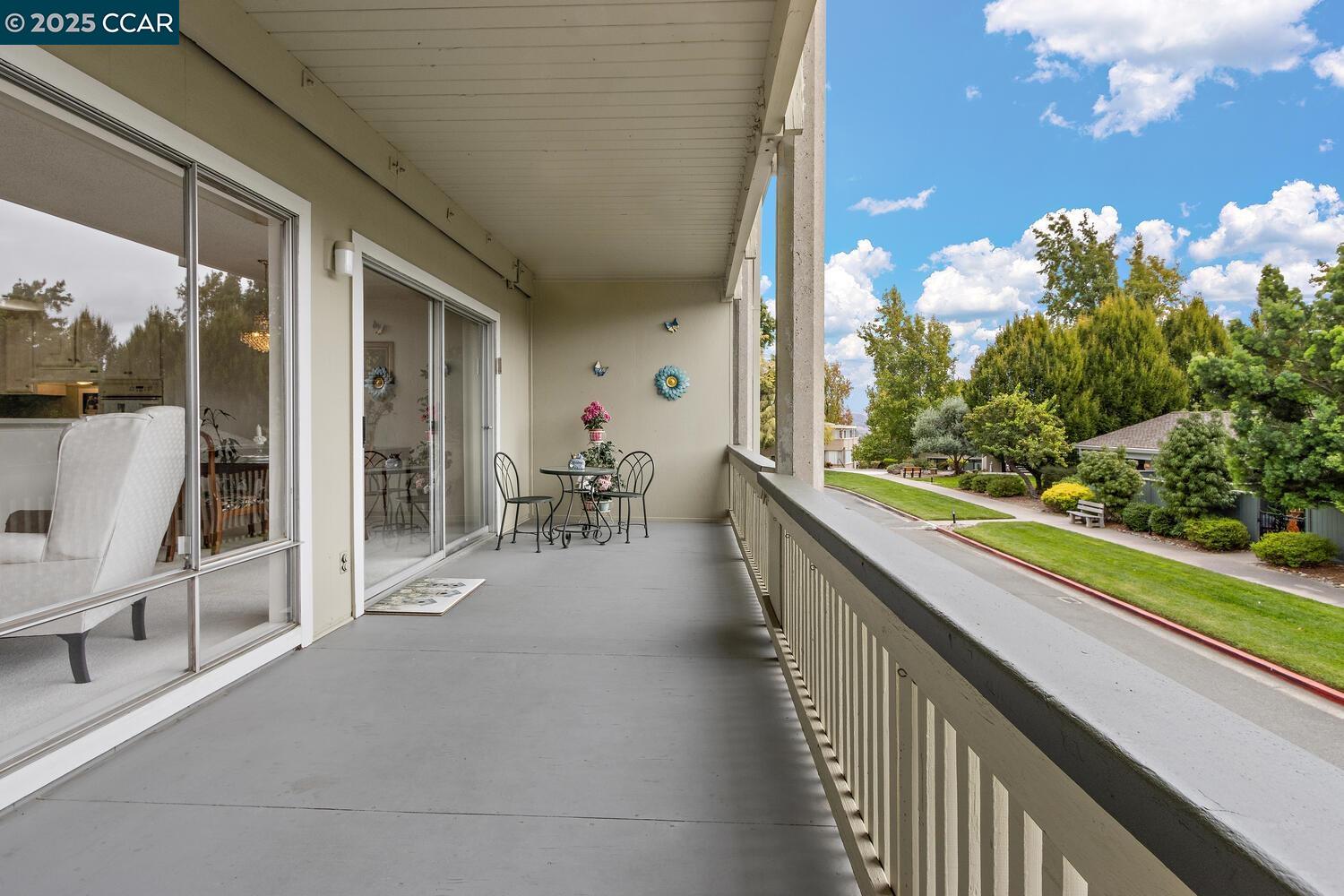 2709 Golden Rain Road, Unit 6 Walnut Creek, CA 94595 - Photo 22 of 46 a view of a porch and garden