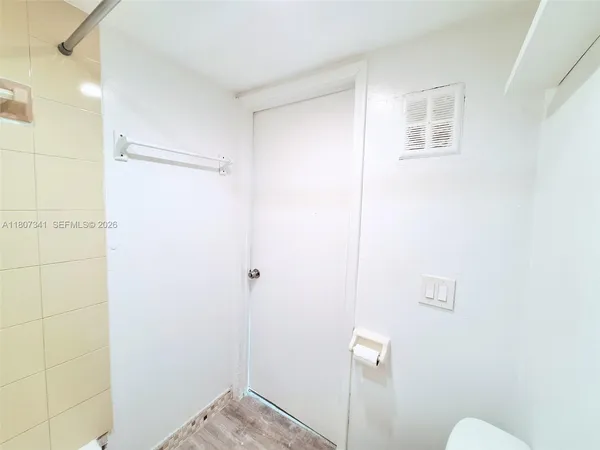 a view of storage and utility room