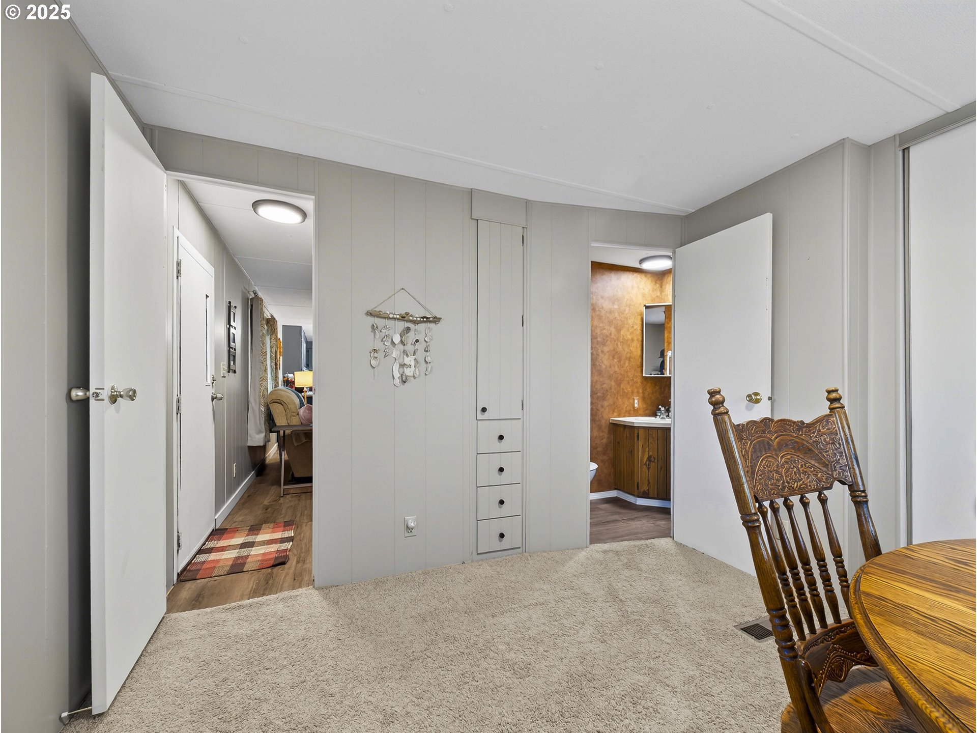 2902 East 2nd Street, Unit 54 Newberg, OR 97132 - Photo 21 of 32 a view of a hallway with staircase and stairs