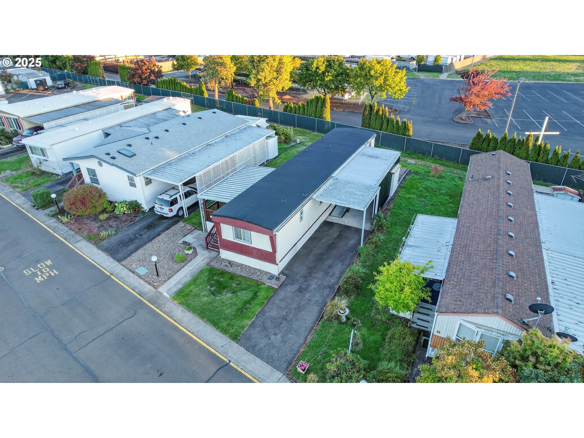 2902 East 2nd Street, Unit 54 Newberg, OR 97132 - Photo 29 of 32 an aerial view of a house with a garden