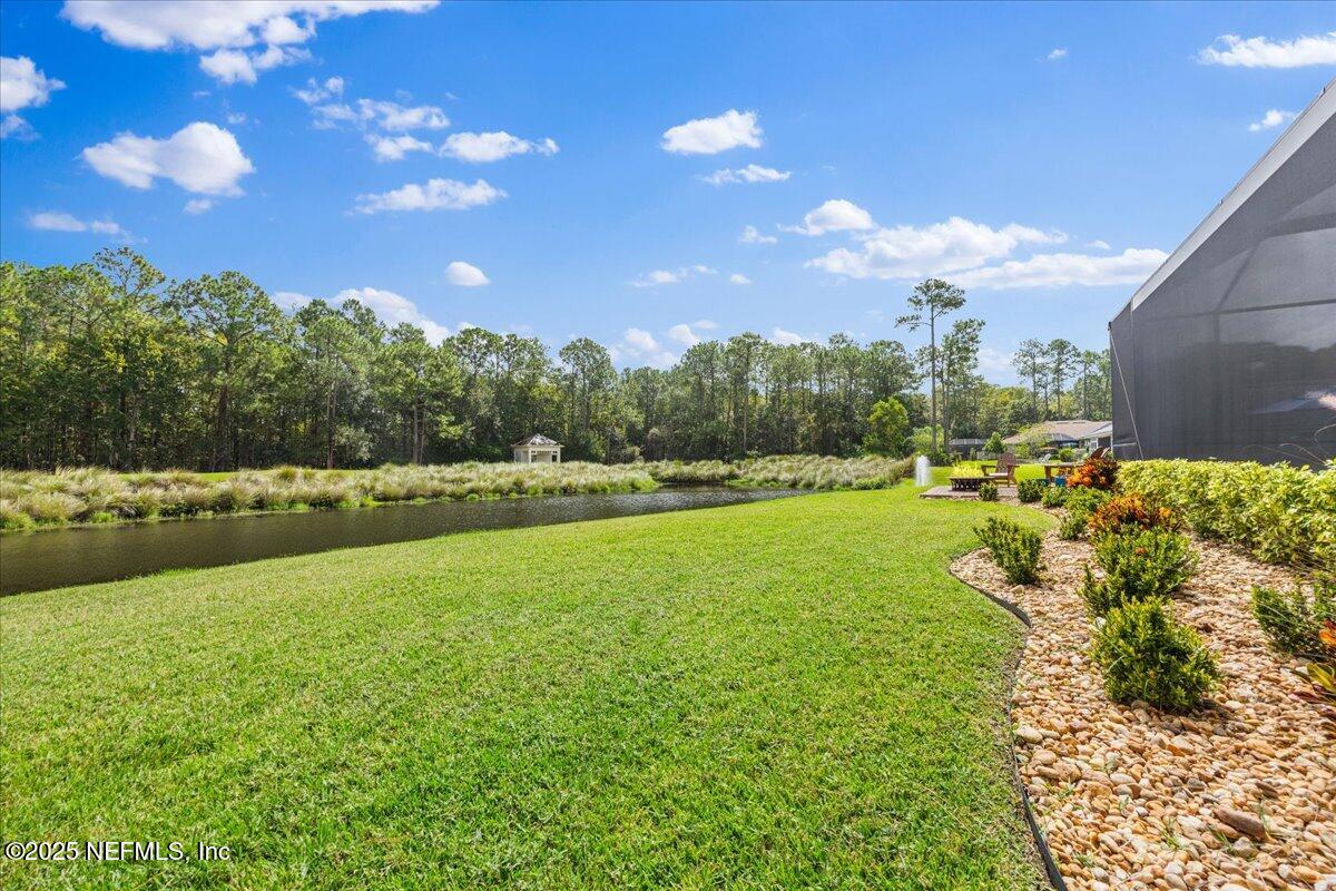 80 Greenview Lane St. Augustine, FL 32092 - Photo 31 of 37 a view of a golf course with a lake