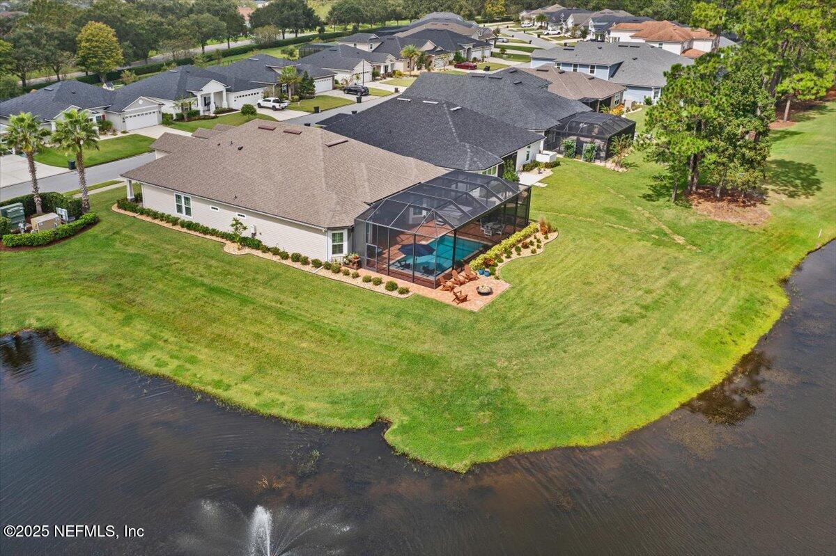 80 Greenview Lane St. Augustine, FL 32092 - Photo 36 of 37 an aerial view of a house with a garden and swimming pool
