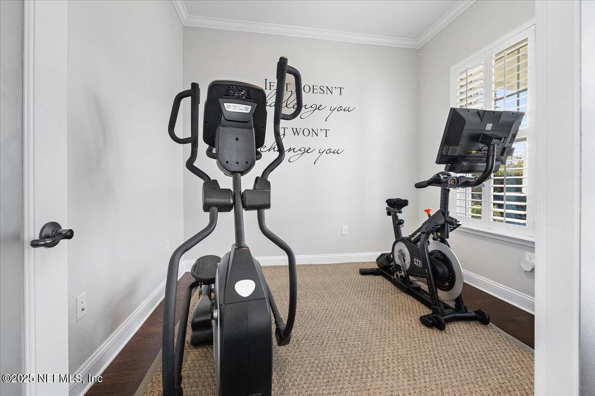 80 Greenview Lane St. Augustine, FL 32092 - Photo 5 of 37 a view of a room with gym equipment