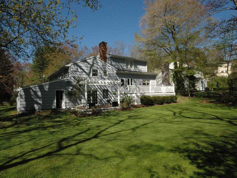 5 Webster Valley Road Darien, CT 06820 - Photo 3 of 25 a view of a house with a big yard