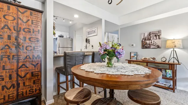 a view of a dining room with furniture