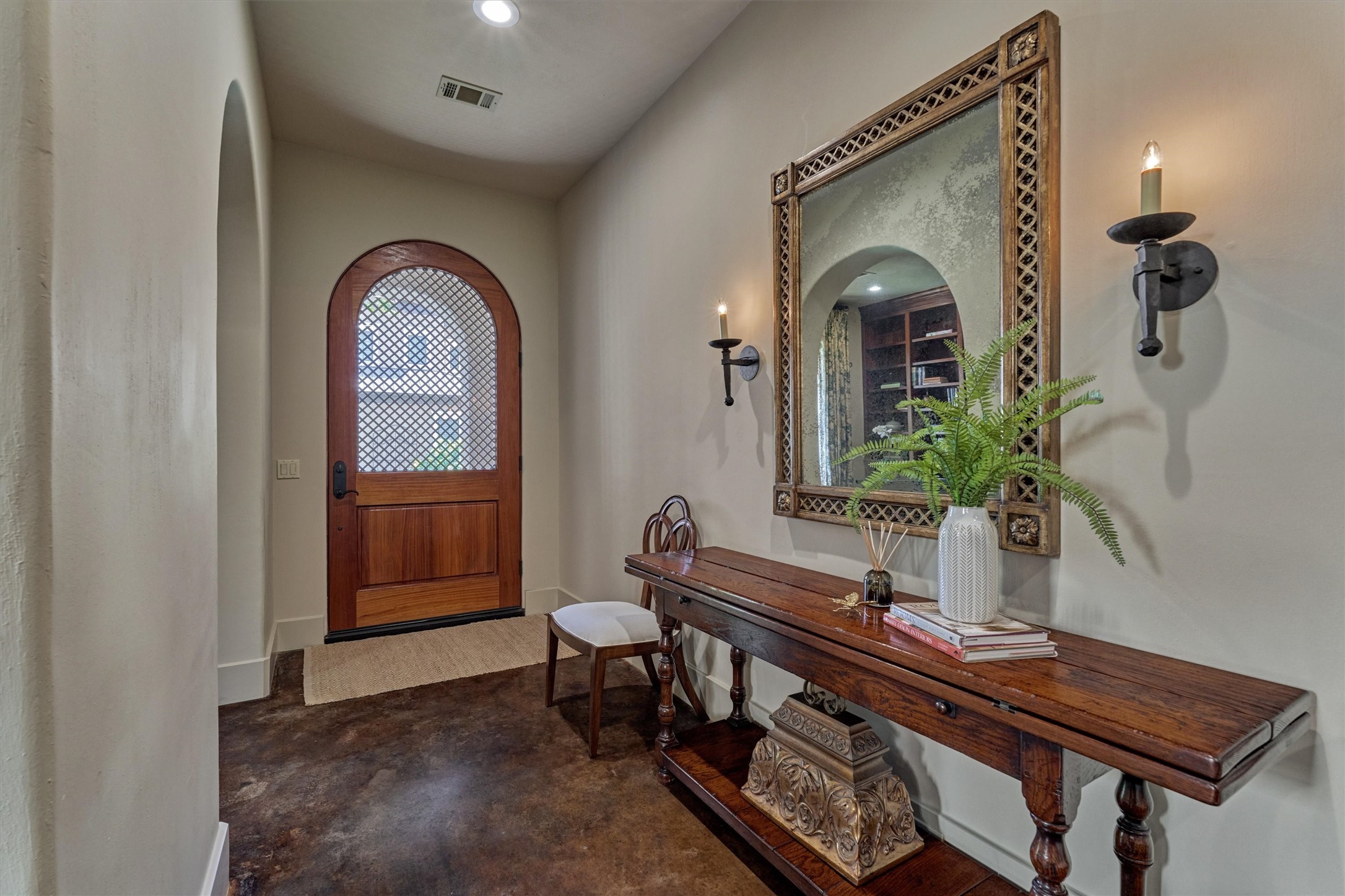 7 Dorset Square The Woodlands, TX 77381 - Photo 7 of 50 Luxury finishes include stained concrete floors, solid mahogany doors, inset cabinetry, modern kerf trimless doorframes and LED lighting.