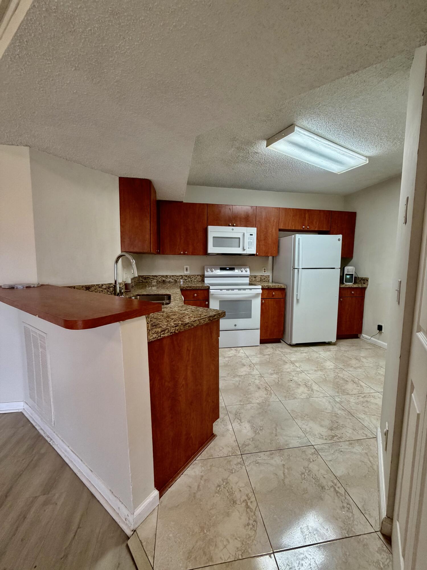 8781 Wiles Road, Unit 203 Coral Springs, FL 33067 - Photo 6 of 17 IMG_6781