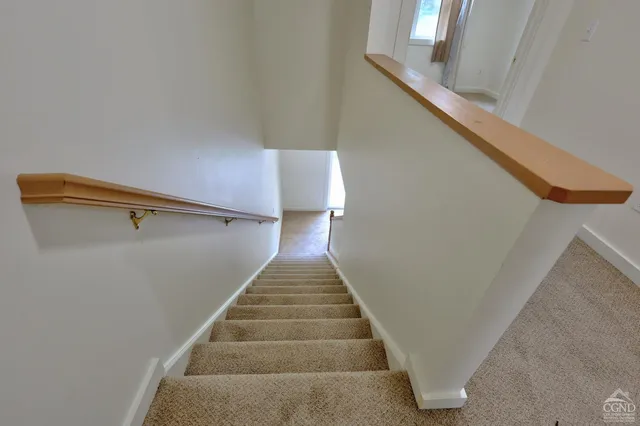 a view of a house with backyard