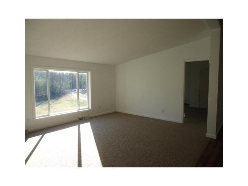 150 Powhatan Road Otisfield, ME 04270 - Photo 11 of 22 Living Room.