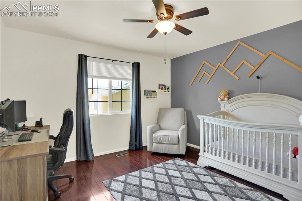 1776 Reilly Grove Colorado Springs, CO 80951 - Photo 16 of 21 a living room with furniture and a window