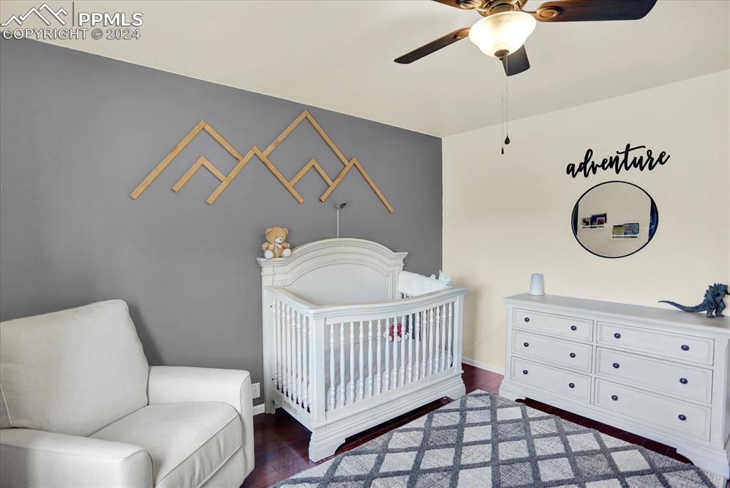 1776 Reilly Grove Colorado Springs, CO 80951 - Photo 17 of 21 a bedroom with furniture and a window