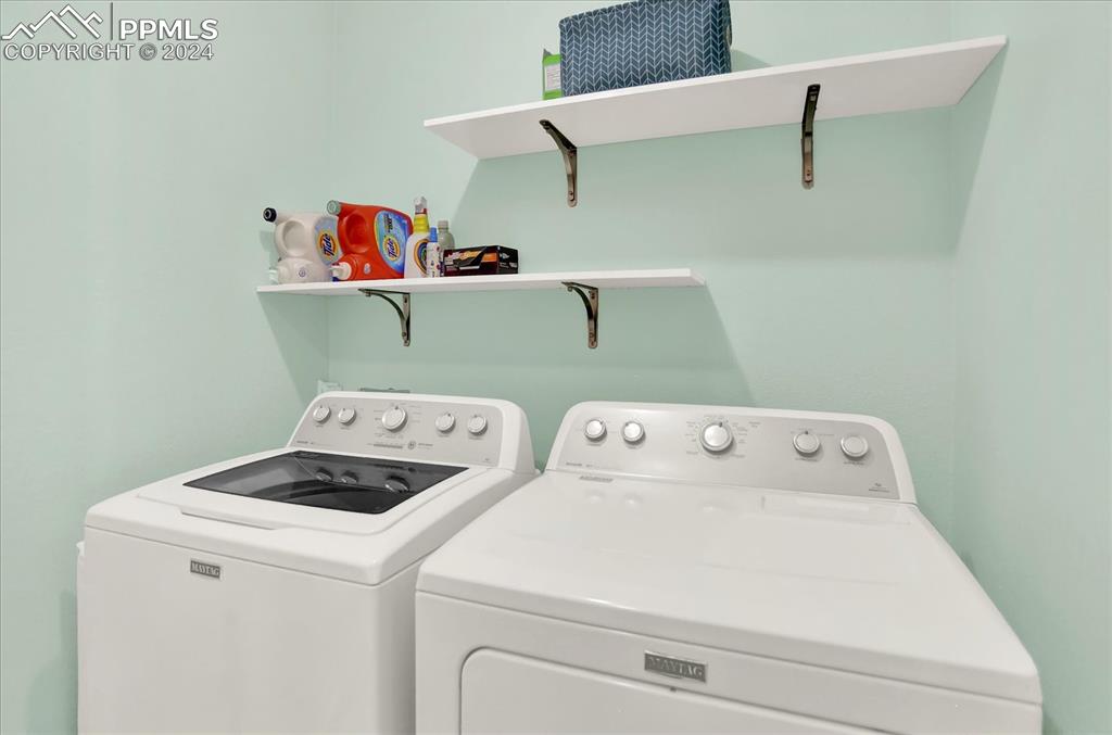 1776 Reilly Grove Colorado Springs, CO 80951 - Photo 19 of 21 a utility room with dryer and washer