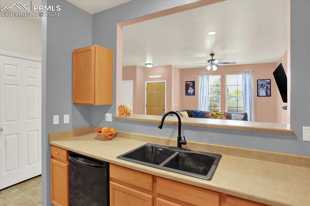 1776 Reilly Grove Colorado Springs, CO 80951 - Photo 9 of 21 a kitchen with a sink and a window