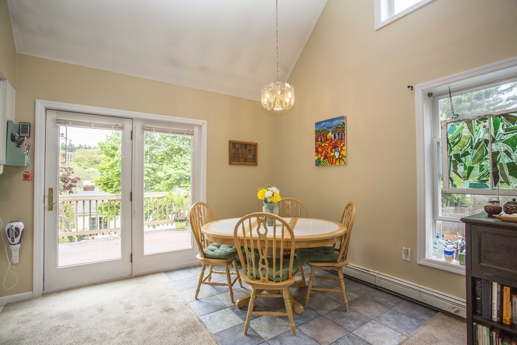96 Park Road Charlton, MA 01507 - Photo 8 of 30 a view of a dining room with furniture and a window