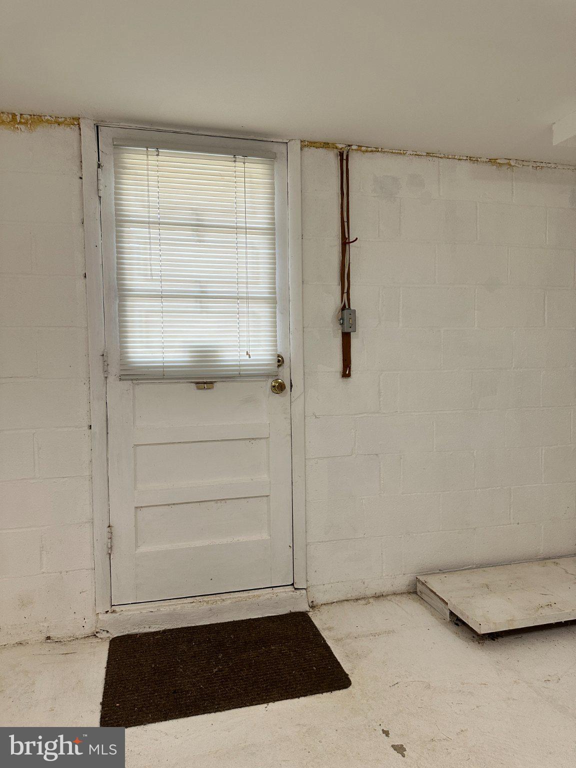 8336 Scotts Level Road Baltimore, MD 21208 - Photo 47 of 55 Bright entryway with potential charm.