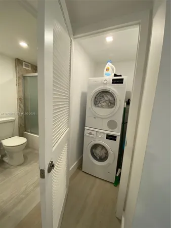 a bathroom with a toilet and a sink